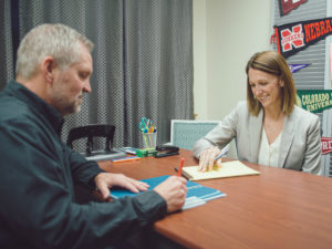 College coaches Tom and Stephanie work together to help student athletes.